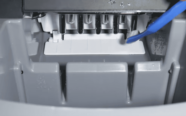 using toothbrush to clean a countertop ice maker